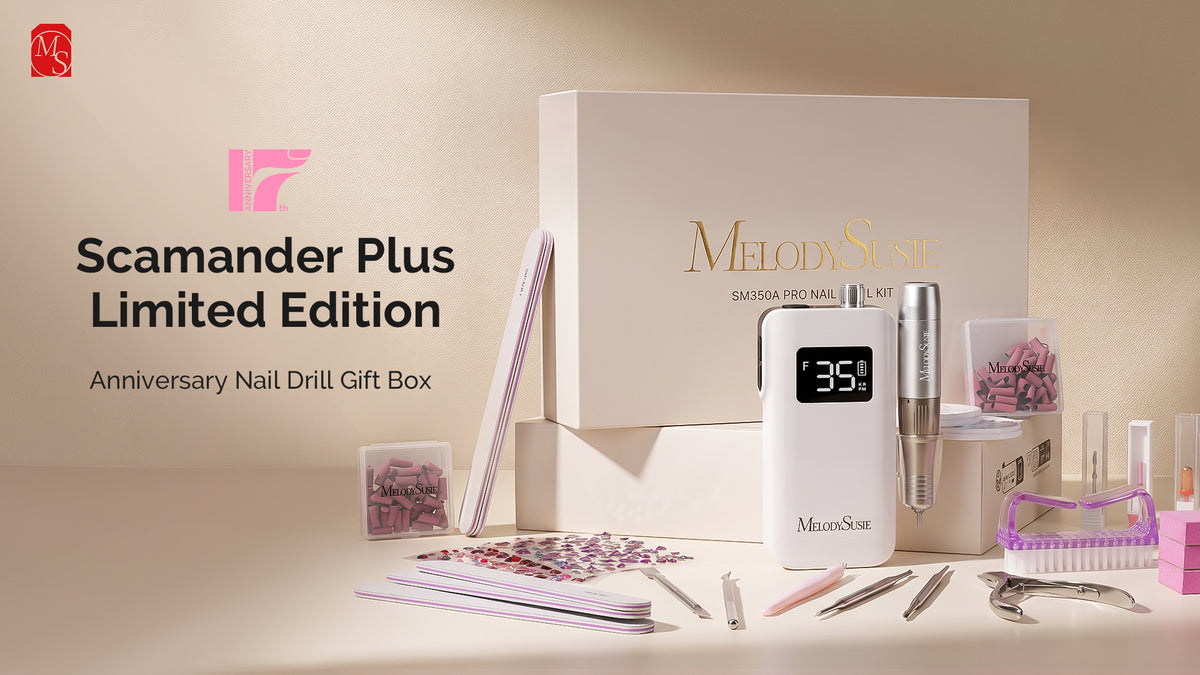 MelodySue Scamander Plus Limited Edition Anniversary Nail Drill Gift Box set, featuring a white electronic nail drill, nail file, nail brush, nail tools, and manicure accessories arranged in front of a beige background with product text on the left.
